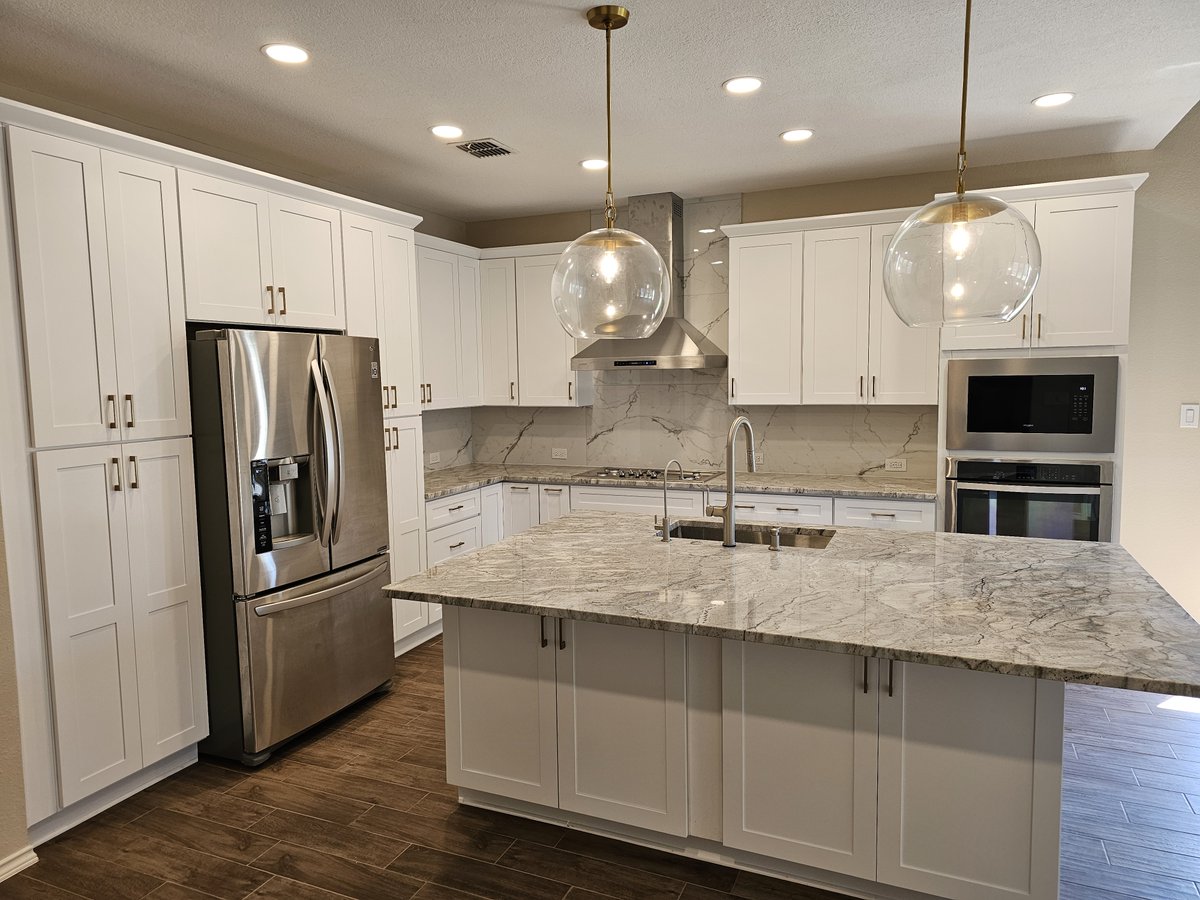 montfortdesign's tweet photo. This is a kitchen remodel we completed in 2024 in Plano. We opened up the kitchen, replaced all the cabinets, created an island, installed granite countertops, new appliances and driftwood tile throughout the home. The last image is the before. https://t.co/VcnVTmZavT