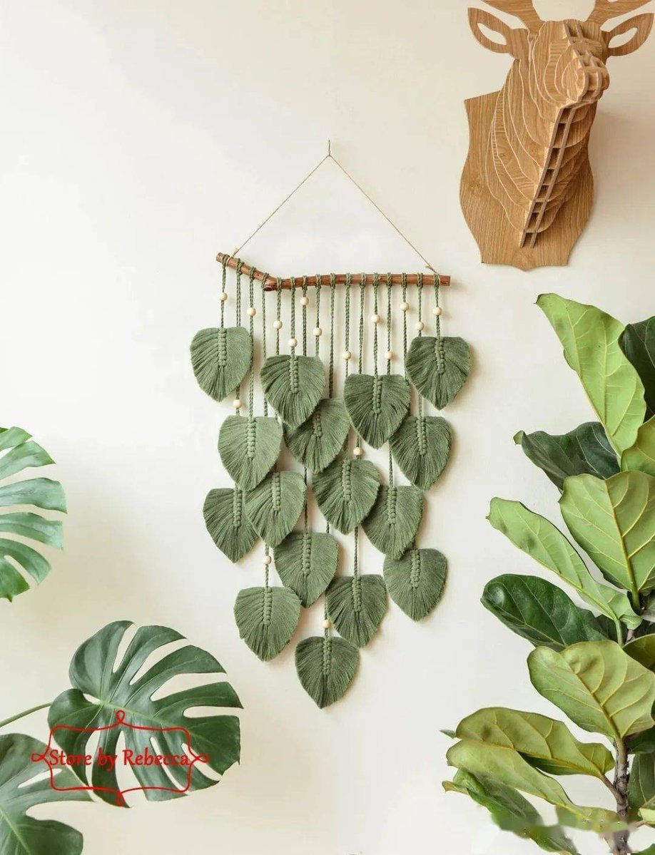 Kit000H's tweet photo. Just finished up a DIY macramé plant hanger using old cotton scraps! Such a quick, cozy project for my tiny balcony #DIYCrafting https://t.co/eFGc0FUwD8