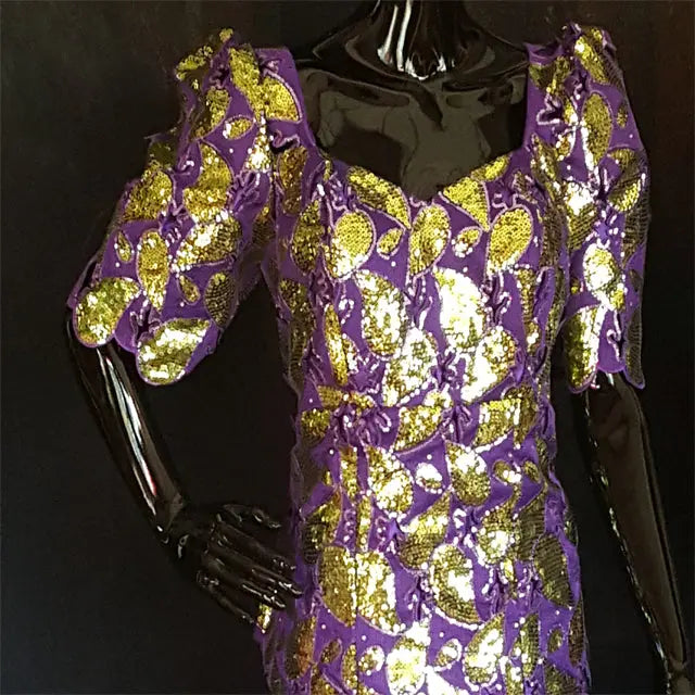 CelineColvoeu9's tweet photo. Looking for the perfect blend of elegance and flair? Our purple African French lace top with dazzling gold sequins turns heads with its luxurious texture and stunning color. Dress it up or pair it with jeans. Only a few left at $79. 99. Shop now. https://t.co/EfvfwZFd7Q