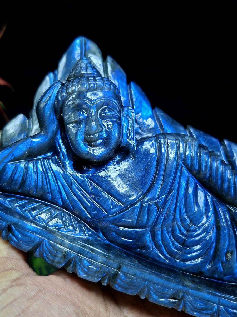 ShwasamC's tweet photo. Looking for a beautiful carving for your home? Choose the Labradorite Parinirvana Buddha Carving for peace and positivity. Its mesmerizing blue flash enhances the carving’s beauty, making it an elegant and meaningful addition to your space. https://t.co/au926hwKCA