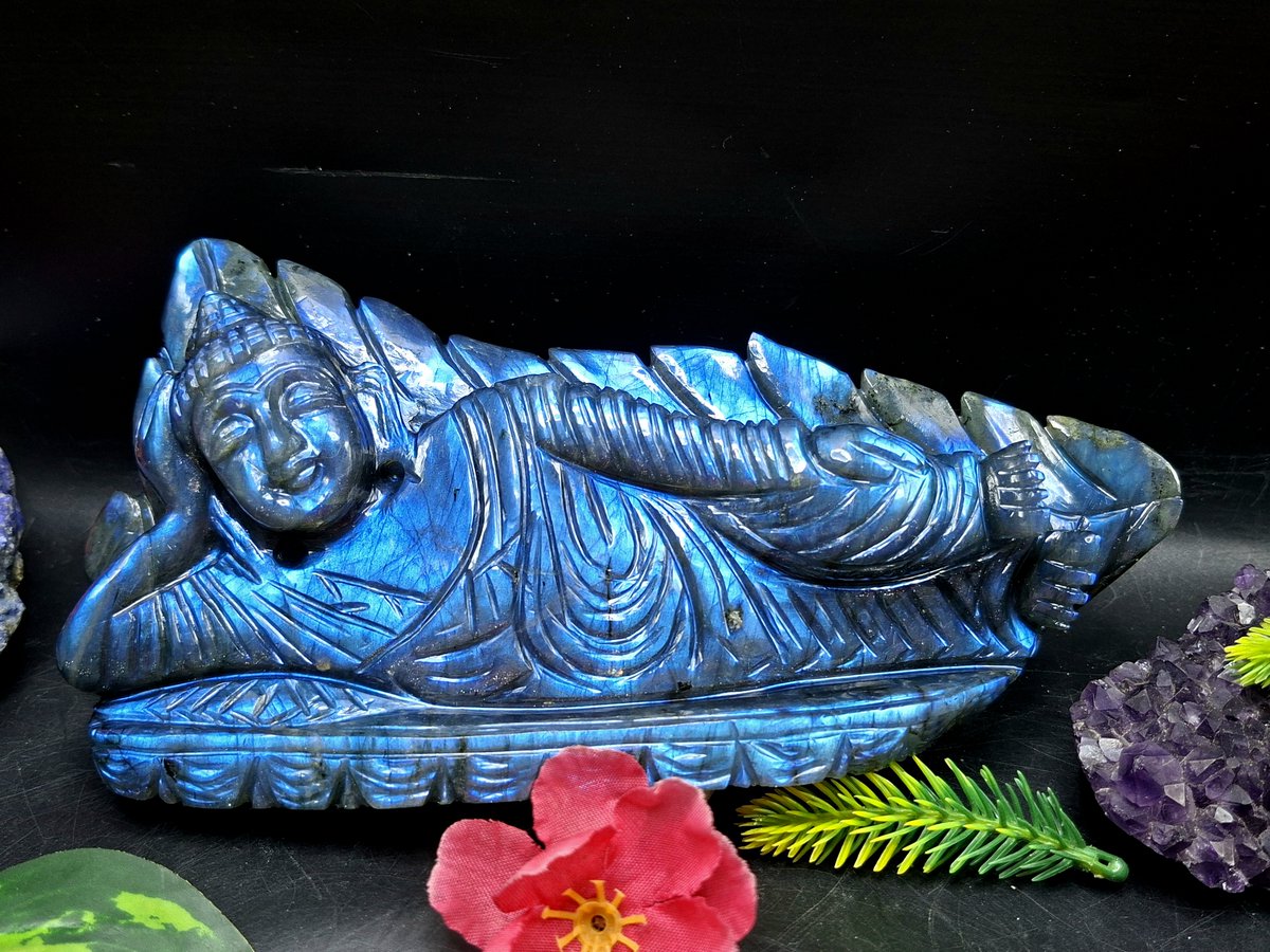 ShwasamC's tweet photo. Looking for a beautiful carving for your home? Choose the Labradorite Parinirvana Buddha Carving for peace and positivity. Its mesmerizing blue flash enhances the carving’s beauty, making it an elegant and meaningful addition to your space. https://t.co/au926hwKCA