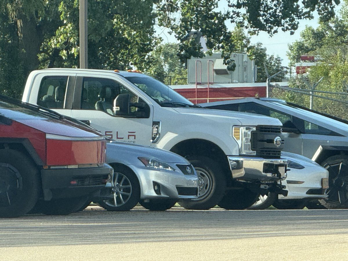 caseymuskegon's tweet photo. @cybrtrkguy why does Tesla Grand Rapids have a Ford F250 Gas Truck?  What can it do that one of their own Cybertrucks can’t? https://t.co/YcLEm6oKA7