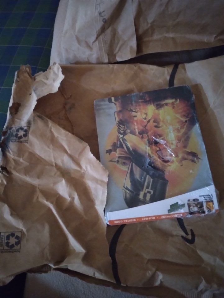 KathrynGeeksOut's tweet photo. Pre-ordered @starwars the Mandalorian and Grogu steelbook from @amazon package arrived all but open and the steelbook is bent to hell with scratches. And guess who doesn’t have them anymore for an even exchange… https://t.co/In7SpQkyvw