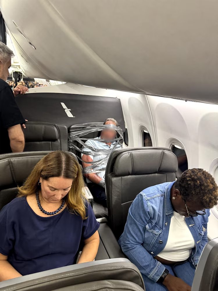 aviationbrk's tweet photo. American Airlines passenger duct tape to his seat following unruly behavior onboard flight AA618 Thursday night.

Arthur Lundeen, 67, of Arizona, was restrained to his seat with duct tape and his hands were restrained with zip ties, according to the Maryland Transportation Authority Police, which arrested him after the plane landed.

Authorities did not provide details of the disruption that took place during the flight, but the plane was diverted to Baltimore Washington International (BWI) Airport around 10:15 p.m., the Federal Aviation Administration, which is also probing the incident, said.