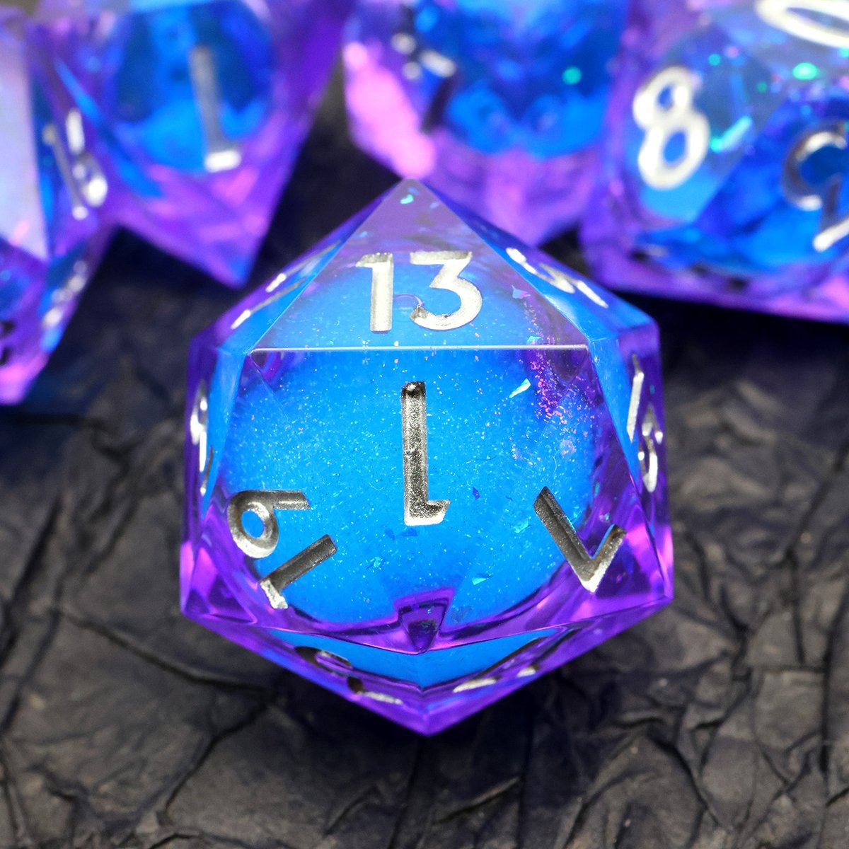 ManyM92950's tweet photo. Pure arcane energy trapped in crystal resin. 🔮✨

Translucent violet crystal encasing a swirling celestial blue liquid core, finished with crisp silver ink. What spell are you casting on a Nat 20? 🎲

#DicePorn #LiquidCoreDice #DnDDice #TTRPG #CriticalHit #DiceGoblin https://t.co/OAv9PxiCzz