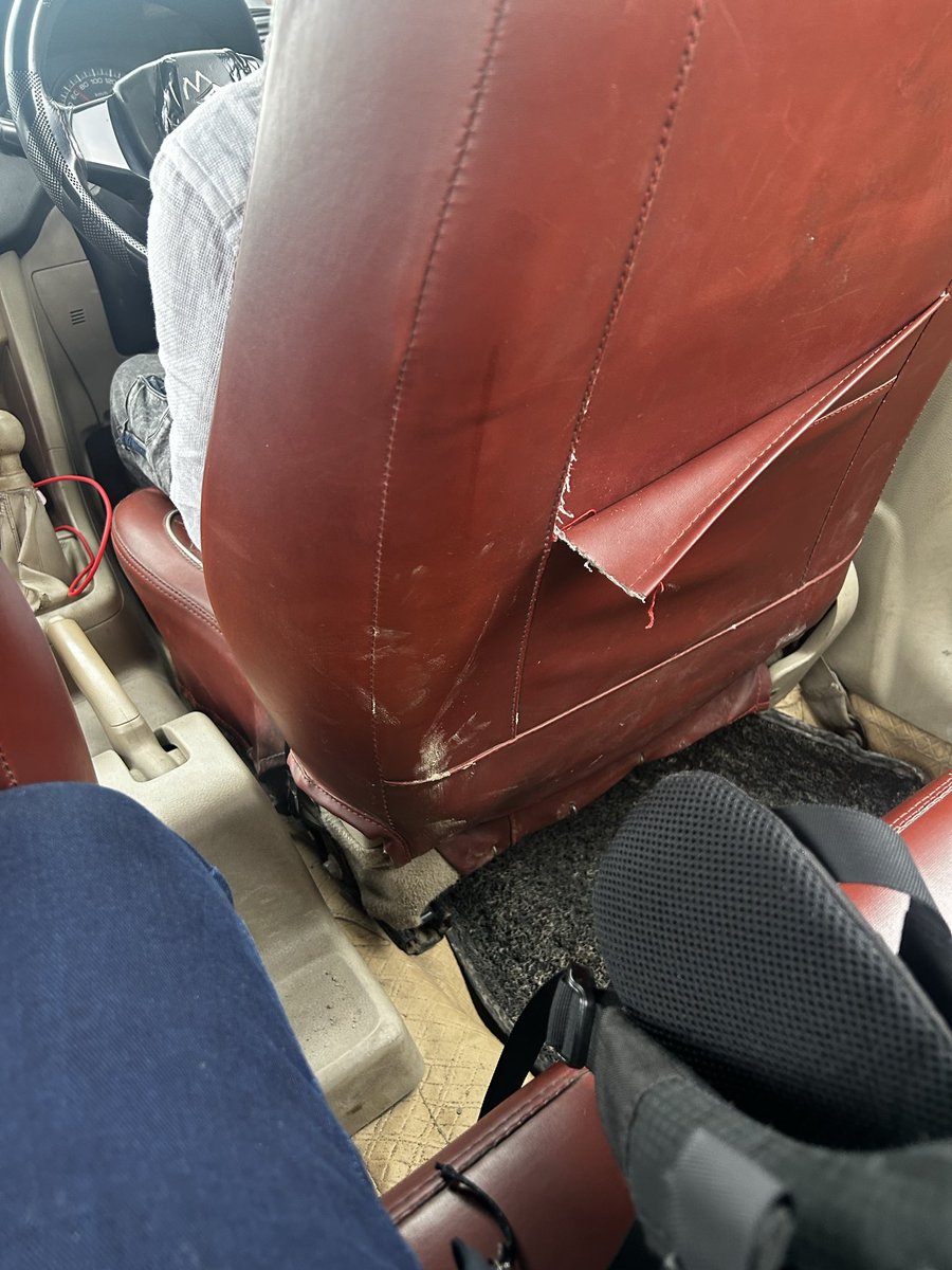 hunkikara's tweet photo. Dear @Uber_India you call this cab a premier cab it was kept together by sticky tape and twine https://t.co/6Me705Pxoh