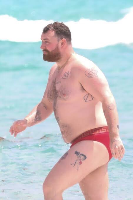 imlolade's tweet photo. Sam Smith is serving looks so intense that a beach sunset suddenly feels like a budget backdrop. Damn. 🔥 https://t.co/zyjdZZy3OZ
