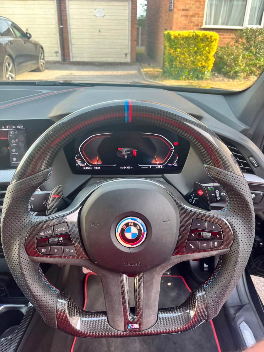 BrynnGleich's tweet photo. The BMW F40 128ti, owned by @badger_128ti. A driver-focused cabin with red-accented sport steering, digital displays, and bolstered styling—built to thrill on every road. https://t.co/fitKZNe7vg