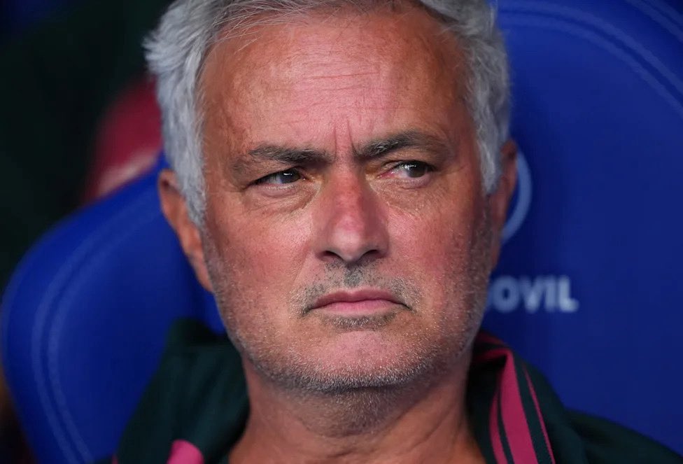 Loconteee's tweet photo. 🧵 Into the Mourinho-verse 2.0.

Only four games in: three wins and one loss to Real Betis. It’s not a full-blown crisis, but the job of the coach is to make sure the situation never gets there as history has shown.

So what have we seen from Mourinho so far?

He doesn’t mind conceding possession. IP, artificial transitions are key to his Real Madrid, with quick combinations used to access vertical spaces. More players are also entering the box, making the block much harder for defences to deal with.

But there are clear negatives.

OOP, Real Madrid can go from an extremely explosive attacking structure into a slow defensive shape that becomes disjointed between the attack, midfield and back line.

There is no true anchor, which forces the CBs to act as one at times, stepping higher into duels while the attackers provide little to no support.

Fullbacks become isolated, which then pulls the pivots towards the sides as a consequence.

Because it was so new, Espanyol, La Real and Málaga simply didn’t know what was coming. Real Betis did.

Pellegrini’s solution was simple: don’t press the CBs, allow the pivots to receive, then accelerate. Their inability on the ball triggers Bellingham and Güler to drop, leaving Madrid’s attack with essentially Vinícius and Mbappé. It worked.

And it runs even deeper.

Real Madrid have a poorly balanced squad. There is no real #6 who can anchor the team positionally while simultaneously controlling the tempo.
Mourinho started with Valverde + Bernardo before shifting towards Valverde + Camavinga.
The reasoning makes sense, particularly with Bernardo being the most dribbled-past player in La Liga.
Except Madrid lose too much IP as a process.

Then there is another dynamic: Vinícius + Mbappé.

Mourinho’s formula is clear:
One player stretches the pitch. The other plays inside.
Arda operates as a +1 midfielder while Dumfries provides the width.
But the left side is different.

Vinícius was initially meant to be the LW stretching the pitch. That’s what we saw against Espanyol, with Carreras providing the inside presence. That has changed.

Vinícius’ legs look heavier, and Mourinho has adapted rather than forcing the original structure. He still provides width at times, but he is no longer a classic touchline winger.
Mourinho has pulled him inside more often, giving the fullback the stretching responsibility while Vinícius becomes more of a secondary CF alongside Mbappé.

With those dynamics established, we get into how Madrid actually attack IP.