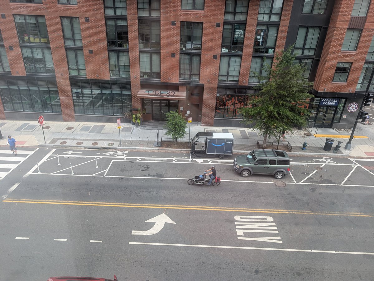 KateRAbbott's tweet photo. @charlesallen Hi @charlesallen @amazon -- there have been many times that Amazon e-cargo vehicles have been parked in the bike lane on I (eye) Street, SE in Navy Yard for over 10 minutes now.  Plenty of legal parking and options around it. Who can we inform with the pilot program? https://t.co/WB81UELOgg