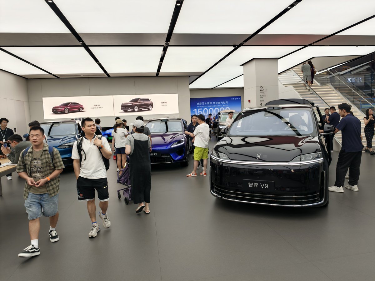 JRUrbaneNetwork's tweet photo. Read this headline standing inside a Shenzhen EV showroom today. I get it, they don't want Americans having access to such affordable, innovative, well made and feature rich Chinese products. https://t.co/JnDTFqheja