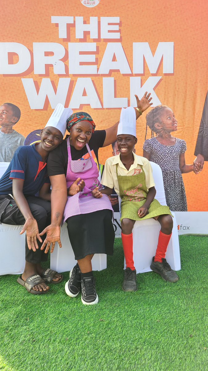 asiimwe4justice's tweet photo. Little People. Big Dreams.
We arrived bright and early this morning.
Doctors. Lawyers. Culinary artists. Creatives. Finance professionals. Organisational psychologists. Social workers. DJs. Nurses. Leaders. Marketers. Brand managers. Storytellers.
Different professions. Different journeys.
One purpose:
To walk with young dreamers.
To listen to their questions. To share something of our own journeys. To pay attention to what was said, and sometimes, what wasn’t.
There were little hands to hold. Small frames to hug.
And somewhere in all of it, many of us were transported back to when this was us, young dreamers, wondering what we would do with our lives.
I loved the honesty of two high-school students at my table.
“We don’t know what we want to be yet. We came for inspiration. Maybe something someone says here will trigger an idea.”
And we assured them: that’s okay.
Sometimes the dream is clear. Sometimes you are still looking for it. And even when you find it, dreams grow, change and refine themselves as we do.
What an honour to be invited by @galuifound, a community foundation rooted in Katwe, to be part of The Dream Walk.
There was something powerful about hosting the Dream Village right here in Katwe.
Because people may make assumptions about children growing up in low-income communities.
But these children have dreams. Hopes. Gifts. Questions. Aspirations.
Today, we did not come to give them dreams. The dreams were already there.
We simply came to walk alongside them for a little while, to listen, encourage and, maybe, make a possibility feel a little more possible.
To the young dreamers of Katwe, thank you for trusting us with your dreams and your questions.
May you keep dreaming.
May you encounter people who expand what you believe is possible.
And may the circumstances of today never determine the possibilities of tomorrow.
Dream on!
#TheDreamWalk #GaluiFoundation #DreamOn #CommunityFoundations
@CivLegacy_F @ninyesigar