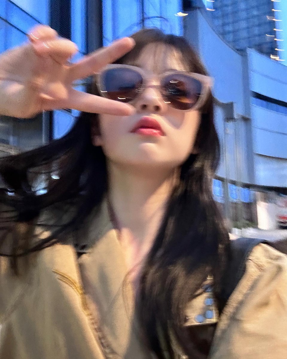 Miaoyid's tweet photo. Catching the fading sunlight on pavement, turning quiet street corners into my own personal runway. https://t.co/RYueXG3hnM