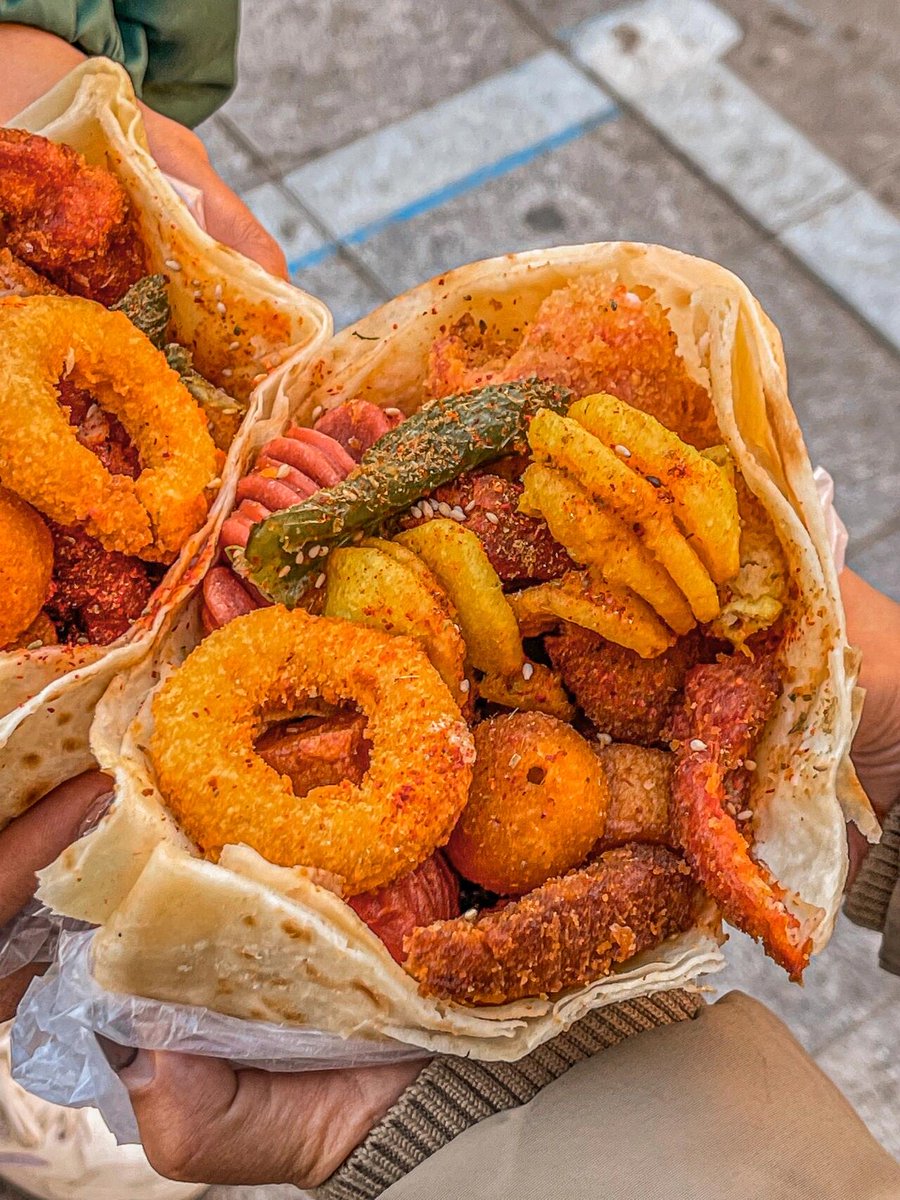 YigitKayawosc's tweet photo. [Mouthwatering crispy fried tofu skewers on a busy street corner—hot, savory, and perfect for a quick snack!]， https://t.co/0qK1xT5HLz
