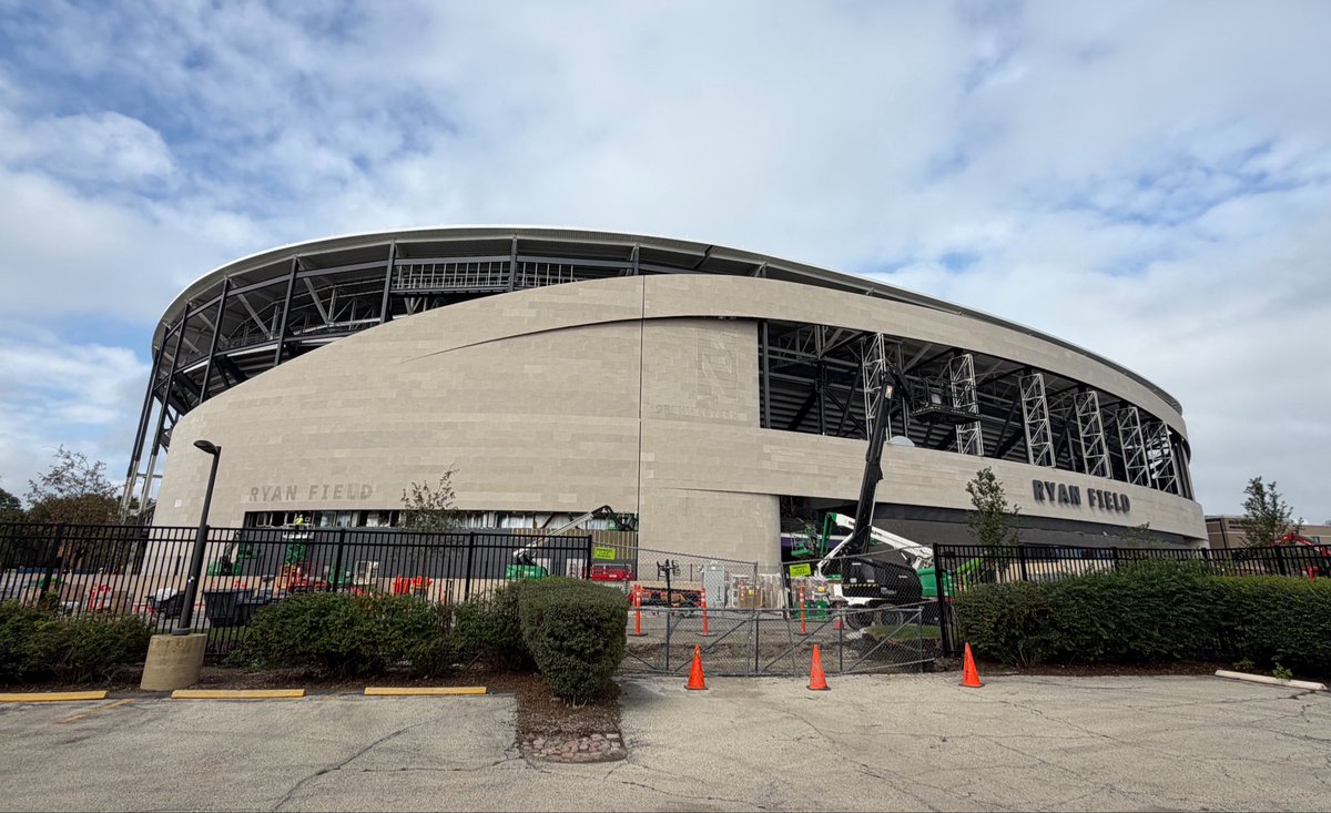 NUFBRecruiting's tweet photo. Drove by @NewRyanField  this morning, and it was a sea of activity with construction workers everywhere putting on the finishing touches. What a truly spectacular stadium - photos simply don’t do it justice. 😳

So much gratitude to Pat Ryan and the entire Ryan family for their incredible generosity and commitment to Northwestern. What they’ve helped create is something very special. 🙏

Can’t wait to watch my first game at the new home of @NUFBFamily. 🔥🔥🔥

Go ’Cats! 💜🏈 🏟️
