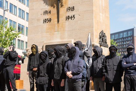 AjaTheEmpress's tweet photo. I do feel the need to point out that these are all the same picture:

1) Men in Dover today
2) Muslim men
3) Trans rights activists
4) Antifa

Some people only seem to have noticed or cared about No. 1.

I don't like any of it, regardless of who's doing it or what label is attached to them.

It is intimidating AF when you're on the wrong side of a group like this, and sadly, like many other women, I have experienced that from groups 3 and 4.

The standard should be the same for everyone. No face covering allowed.