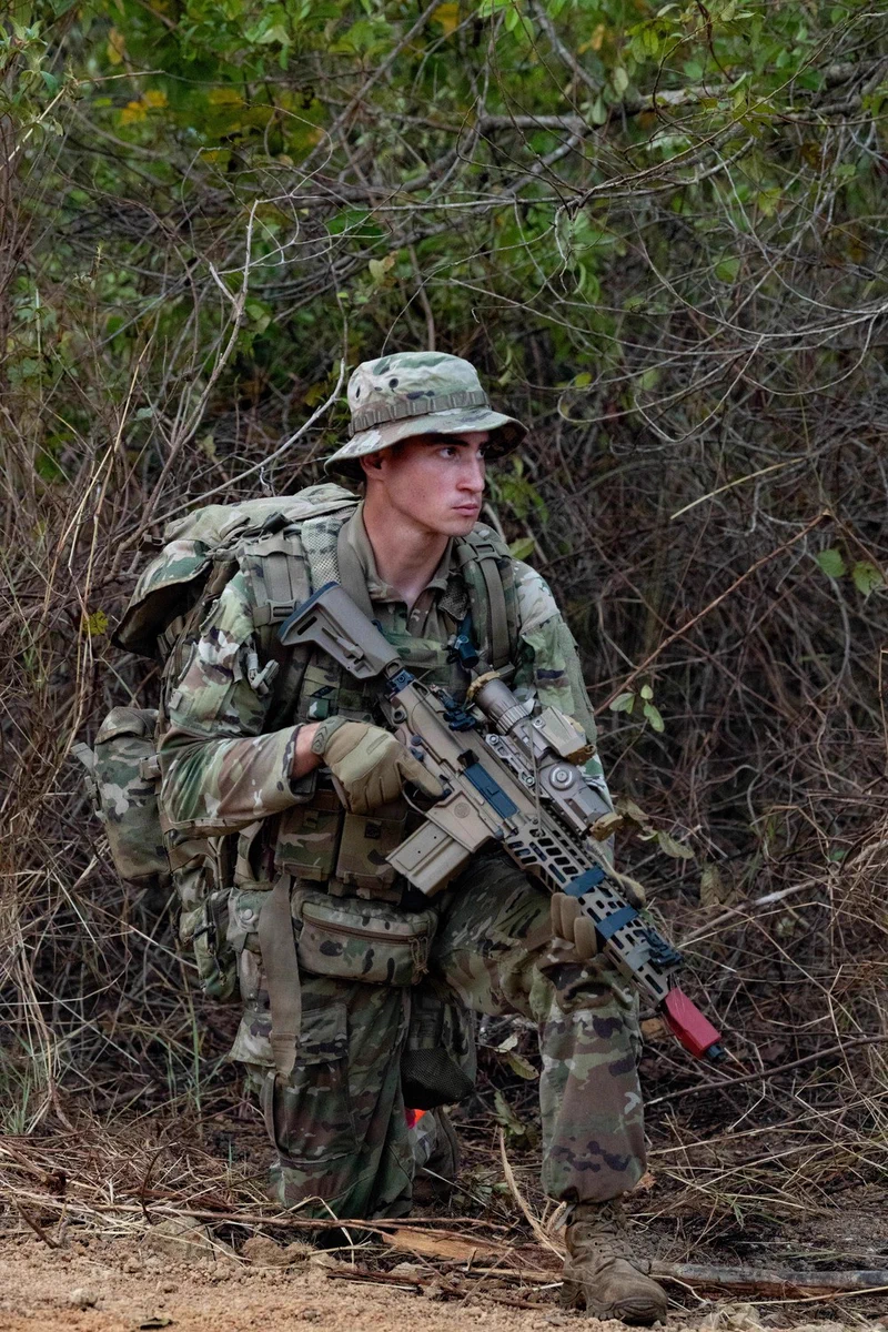 U.S. Army Reserve Sgt. Jacob Vadais from the 100th Battalion, 442nd Regimental Combat Team, moves into position at the rally point during Exercise Ksatria Warrior 2026 (KW26) at Baturaja Combat Training Center, South Sumatra, Indonesia, Aug. 20, 2026. The combined training strengthens interoperability between U.S. and Indonesian forces while building readiness, reinforcing military partnerships and providing both nations an opportunity to learn from one another in a realistic training environment. (U.S. Air Force photo by Staff Sgt. Ashley L. Gardner)\n