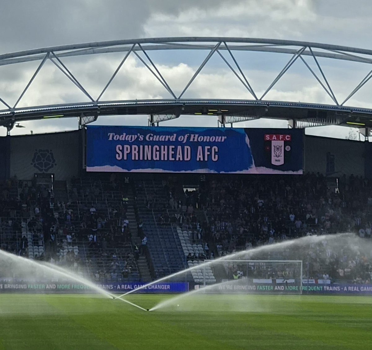 SpringheadAFC's tweet photo. Today has been a very exciting day for our Under 8s Owls, they were the flag bearers for Huddersfield Town FC, in front of a crowd of 18,000 people! 🔵⚪️

They were amazing and a credit to our club, making memories to last a lifetime! 

#UpTheHead 
🇾🇪🔴⚫️ https://t.co/B5Tg2UxSHq