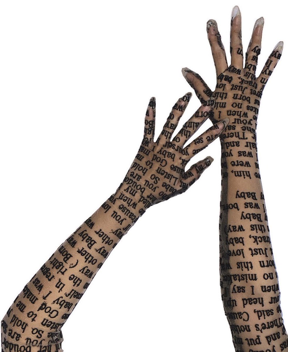 itsbleekerxox's tweet photo. The top is originally hand embroidered by small Vietnamese designer DATT &amp; came with matching gloves. It's intentionally made with sheer chiffon to mimic tattooed artwork.

Its 2022 Popularity brought mass produced knock-offs of cheaper white tees that screen print instead ☹️ https://t.co/CC66lMwDv0