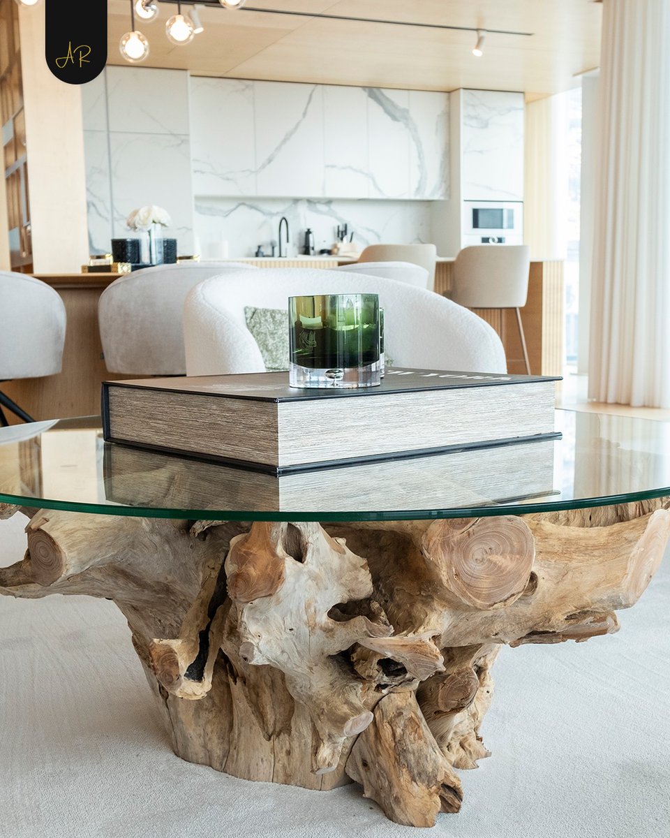 BenRCampbell's tweet photo. Contrast gives this space its character. A natural tree trunk coffee table adds texture and imperfection to clean lines, creating balance. Do you like details like this in decor? https://t.co/ucIj74B7IV