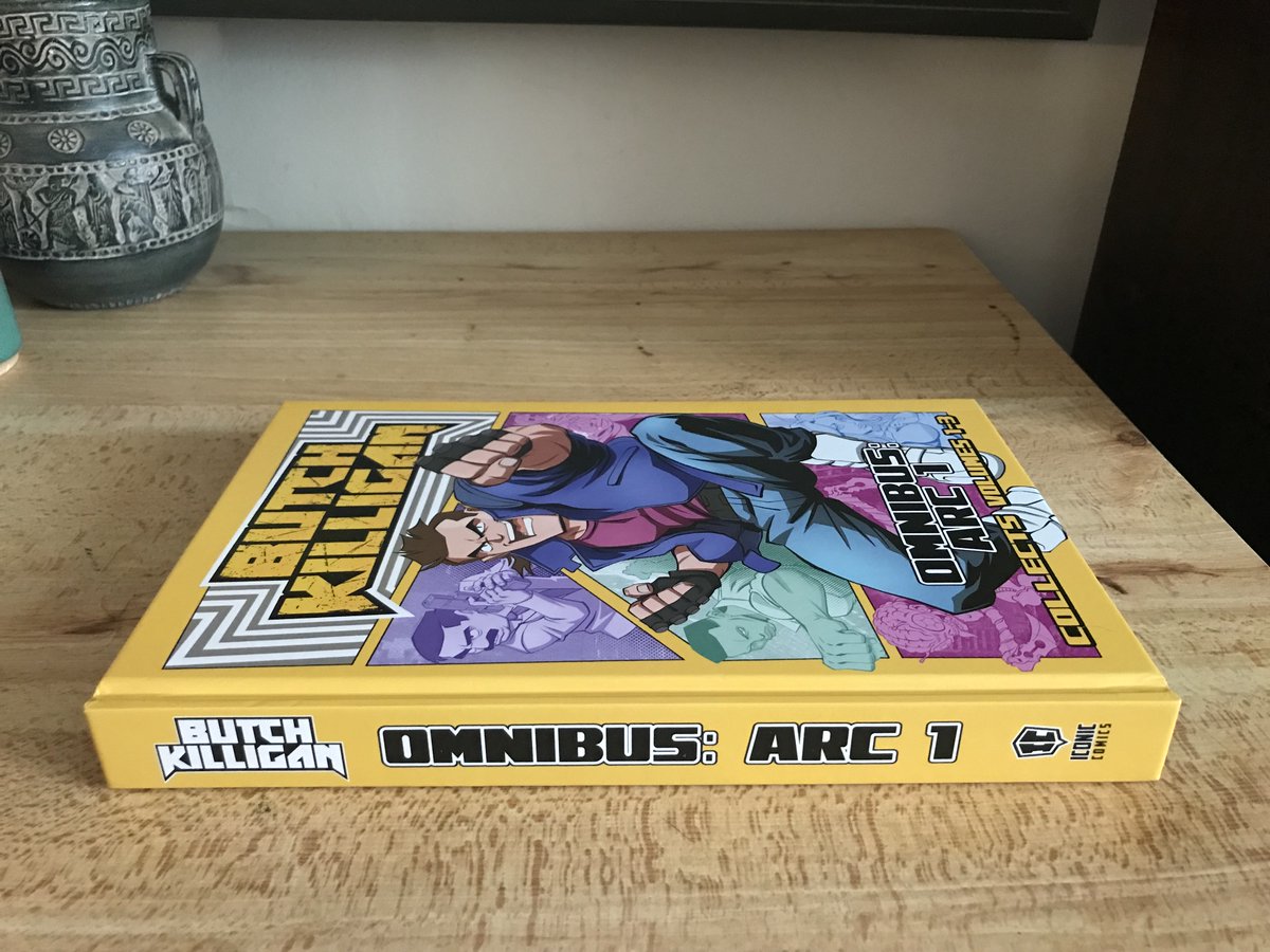 jamezsr's tweet photo. I'm glad I am late to the Butch Killigan party because the hardcover omnibus that collects the first 3 issues is sexy as hell. I was expecting it was going to be the typical Japanese collected omnibus size but it is actually HUGE. As others have said you could probably bludgeon someone to death with this absolute brick of a book. I have been cracking up like an idiot for the past few days at the copious amounts of violence and gags in BK. I assumed since I find Sven funny I would probably enjoy BK and I was correct. I handle a lot of books and the quality of the book binding appears to be very good. Nice cloth headbands on the spine, colors really pop, etc. I really appreciate that the variant covers were included as well. Very happy with purchase. @Butchkilligan @svenstoffels