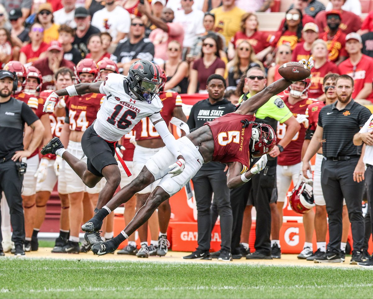 ReeseStrickland's tweet photo. Sep 5, 2026; Ames, Iowa, USA; Iowa State Cyclones cornerback Beni Ngoyi (5) intercepts a pass intended for Southeast Missouri State Redhawks wide receiver Khylen Harris-Norman (16) at Jack Trice Stadium. Mandatory Credit: Reese Strickland-Imagn Images https://t.co/jagvgxZt2i