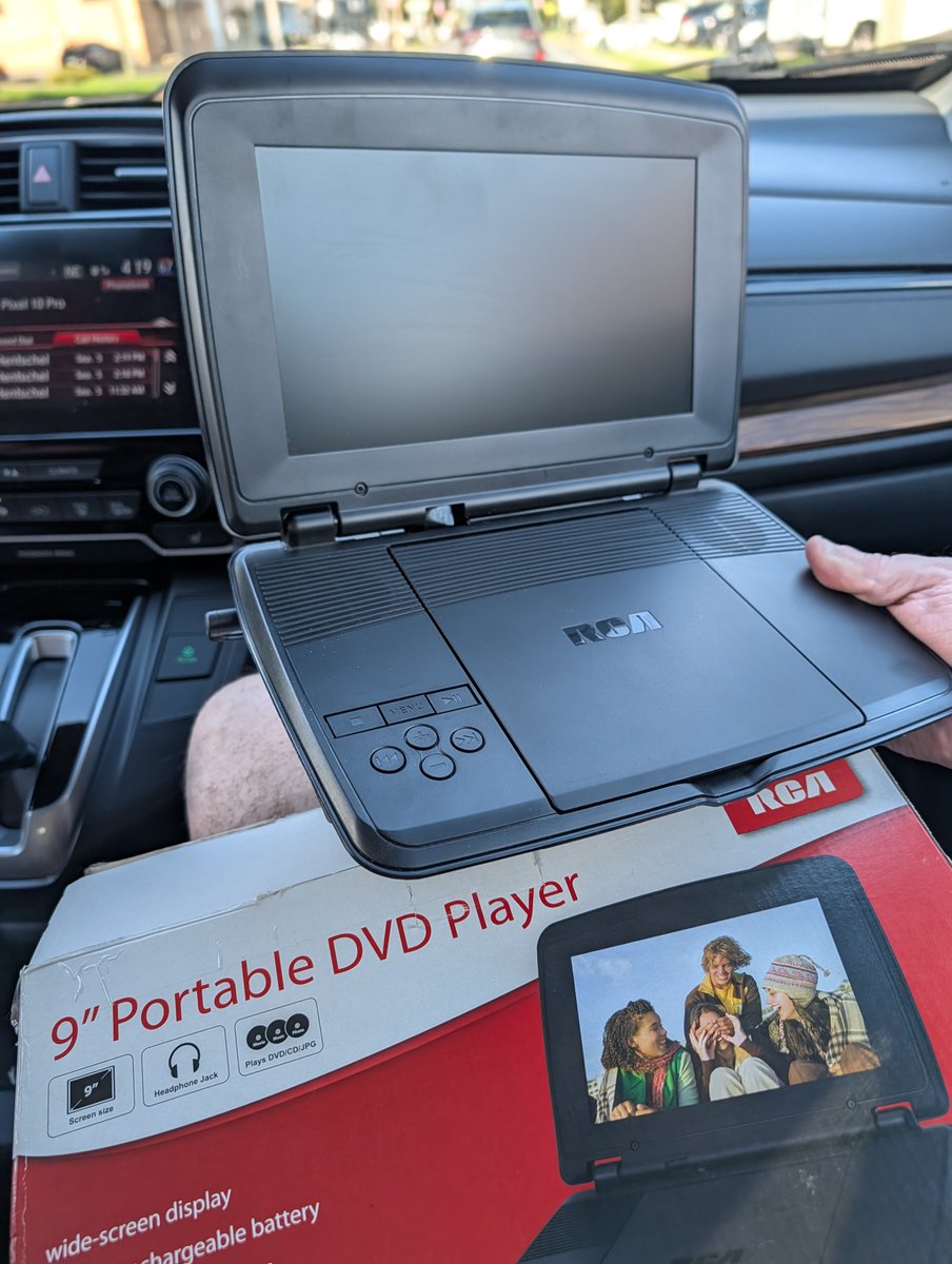 Lord_Wompus's tweet photo. My wife found me a $13 portable DVD player at Goodwill. Complete in box. It works great. 🙂 https://t.co/hMv2TnAJd8