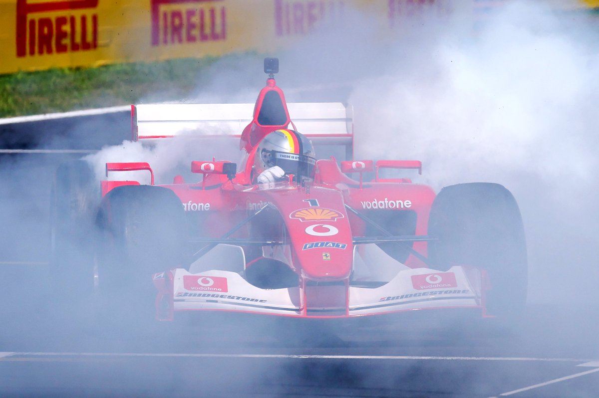 F1's tweet photo. A day Seb will never forget 

#F1 #ItalianGP https://t.co/cIRegdLA2C