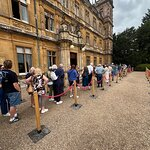 CastlesBritain's tweet photo. We Paid £60 for Highclere Castle — Then Walked Away

I genuinely thought a 12.30 timed slot meant the queue would at least move.

We’d paid £60 between us. Then we stood there for about 45 minutes while the line barely crept forward. From where we were, it looked as though the crowds already inside were inching through the house too.

At some point I realised I wasn’t excited anymore. I was just furious that our visit had turned into standing outside and watching the clock.

So we did the ridiculous thing: we left without even going in.

The disappointment carried on outside. The grounds felt shabby to us, and the tarmac paths only made the whole thing feel flatter than I’d imagined.

I can accept queues at a famous place. But paying £60 for a timed slot and giving up after three quarters of an hour without getting through the door? Absolutely maddening.