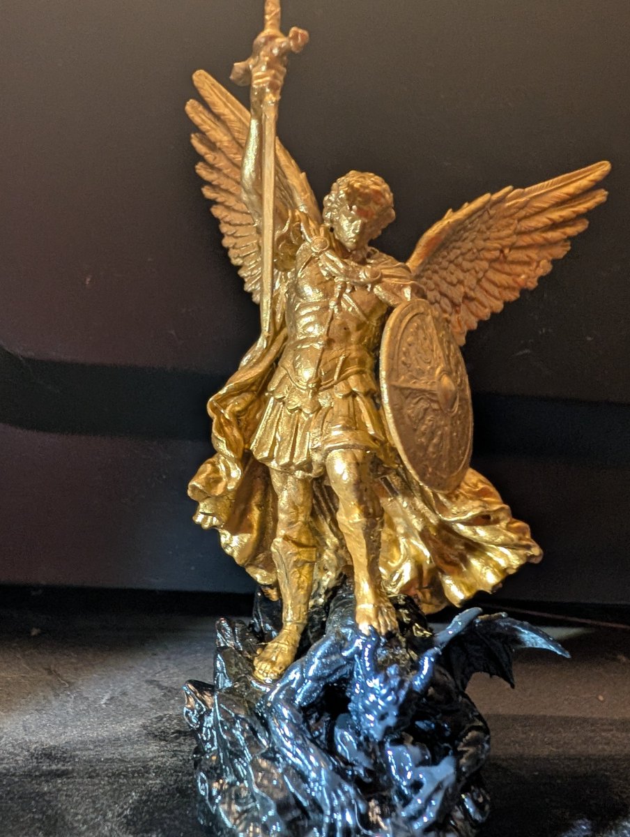 ORarttherapy's tweet photo. Just pulled this St. Michael piece off the build plate. The details on the wings and shield are absolutely insane. Cleaned up, cured, and ready for the next phase. What color scheme should I go with—classic bronze or marble? 🎨🤖 #3DPrint #Elegoo #Hobbyist #TabletopGaming https://t.co/pYm5YjD7Pz