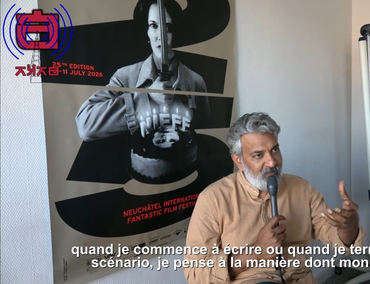 Speaks_Div's tweet photo. New #Rajamouli Interview just dropped, straight from #NIFFF 2026 (Switzerland based Film Festival), here's every major thing he talked about:
1. #Varanasi Started off as an Adventure movie, the scale kept on expanding from becoming a multi-regional shoot, Varanasi to Africa to Antarctica, to time-travel into Ramayana Time Period.
2. Today at its core Varanasi is (directly quoting him) "an emotional story of a father-son bond, emotional story of lovers."
3. #BaahubaliTheEternalWar will be in theatres & in "Full-screen IMAX". Now full screen Imax can mean 1.43:1, or it could mean 1.90:1 but for the entire duration. Clarification on which of these comes true wasn't provided in the interview.
4. Eternal War began with Ishan Joshi suggesting what if we explore the afterlife of the gods, how would Baahubali react in the 14 realms of Indian Mythology. After big budgets & a Collab with Alcyde (French Animation Studio) they finally locked the vision.
5. Rajamouli also talked about how cinema for him IS "Big Screen" & also showed his admiration for IMAX. Also reiterating Varanasi as "Filmed For IMAX".
Other than this, he talked little bit about Eega & his earlier projects, but nothing more (or new) about his future movies.