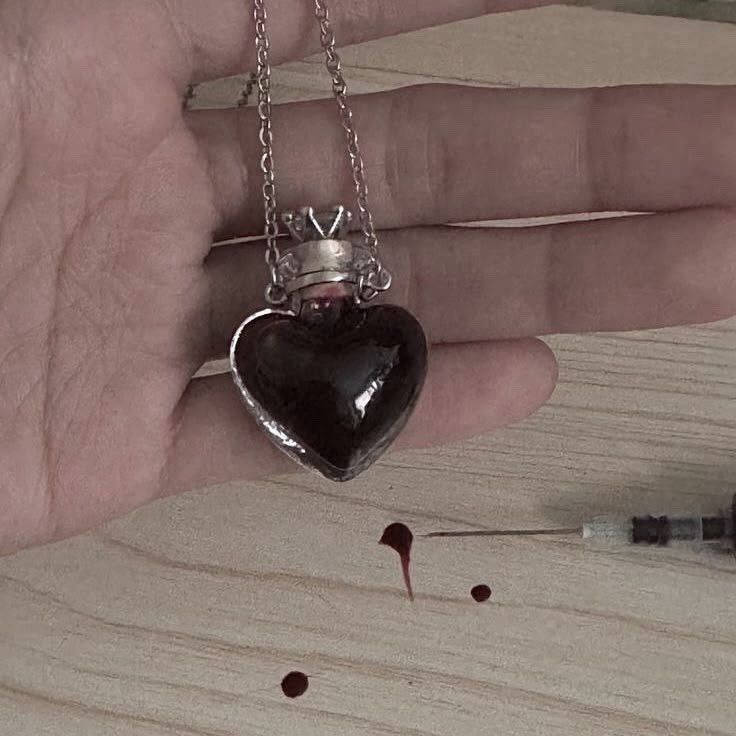 autopsyruin's tweet photo. wearing necklaces with each other’s blood >>>> https://t.co/A4tnLV3qIu