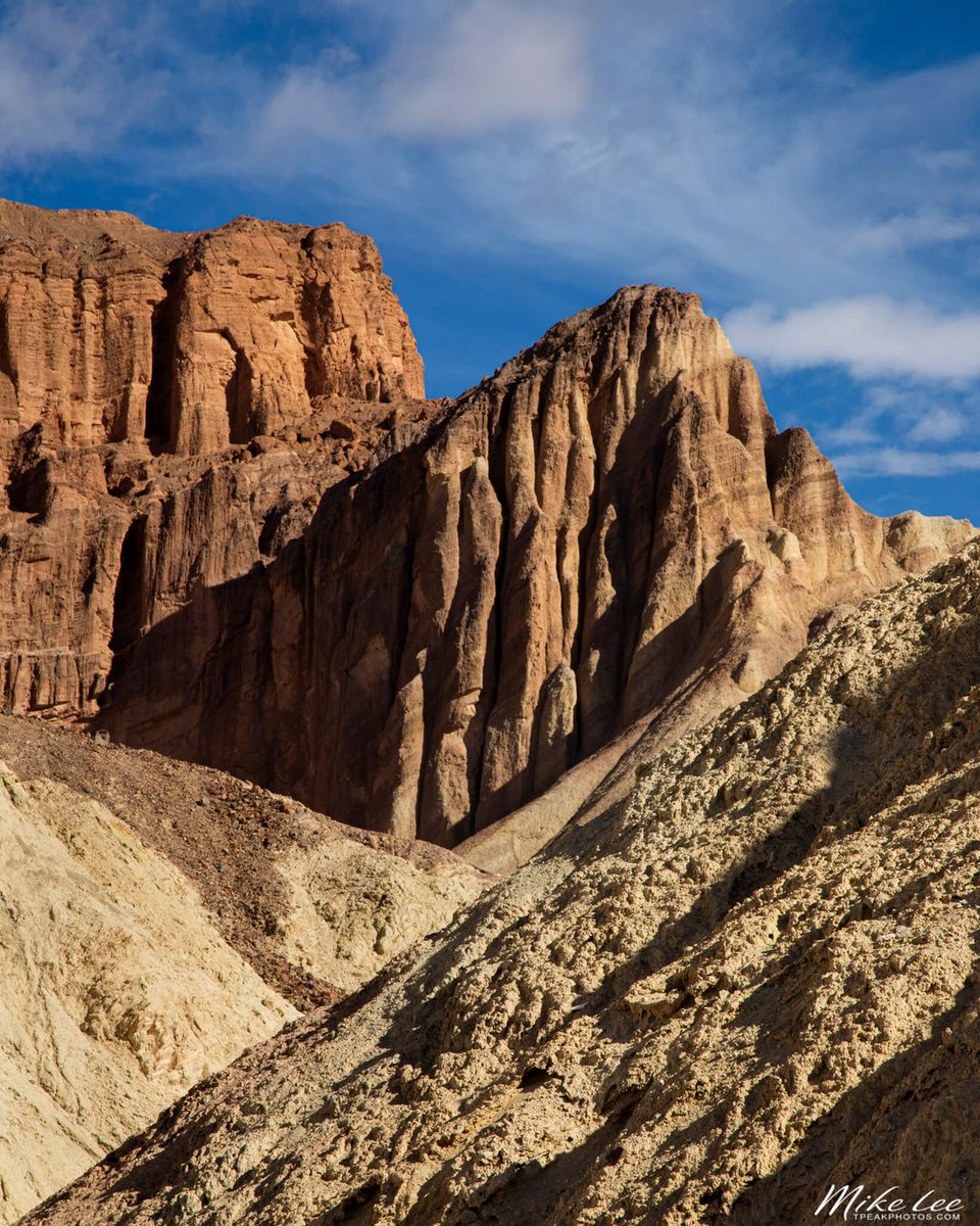 tpeakphotos's tweet photo. Golden Canyon's maze of sculpted cliffs leads toward Red Cathedral in Death Valley National Park, midday light filtering through high wispy clouds to bring out the canyon's rich geological layers.

#DeathValley
#GoldenCanyon
#tpeakphotos https://t.co/RVGlJmZ2d6