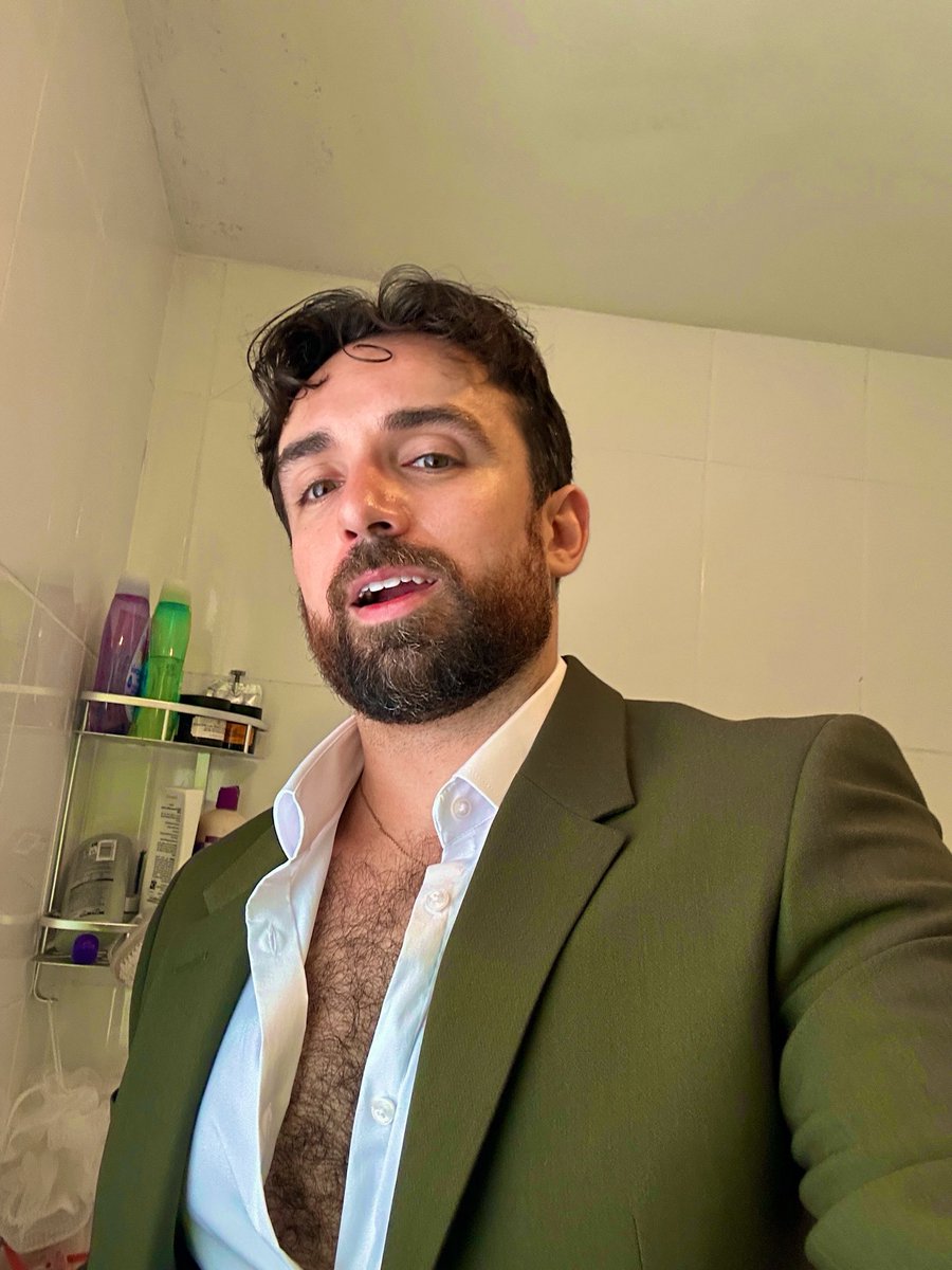JJFroud's tweet photo. Okay fine I’ll wear a suit but you CAN’T stop me from showing off my chest hair https://t.co/6zj0y7Uk9B