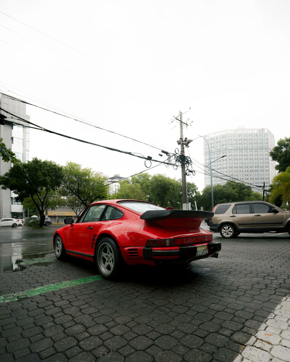 JanettaLundmark's tweet photo. Heading out in heavy rain to photograph cars isn’t always ideal, but sometimes the wait pays off. When the rain eased, several sports cars appeared, including this Porsche 911 (930) Turbo Slantnose—one of my favorites for its futuristic design and https://t.co/dGvJHcyPhu