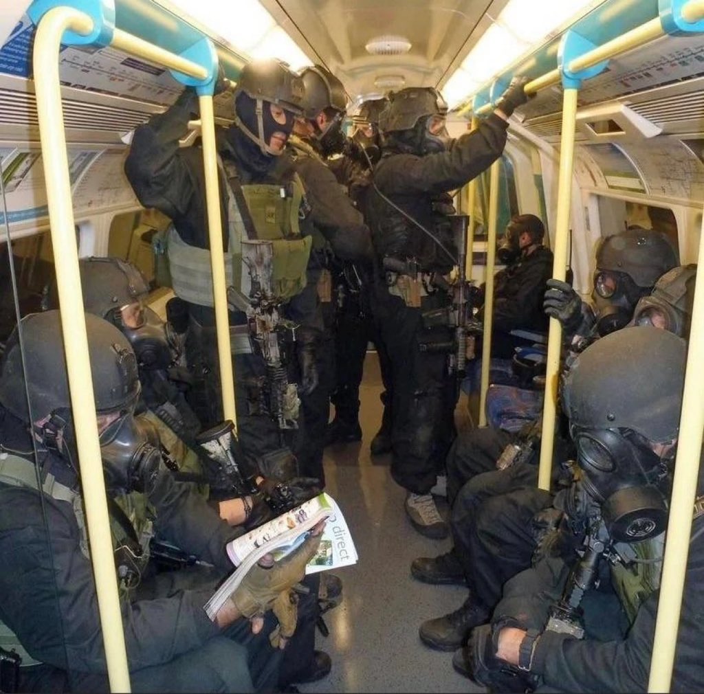 specopsmag's tweet photo. Special Boat Service operators riding the London Underground en route to a counter terrorism exercise, date unknown. https://t.co/NM5XIoHnqr