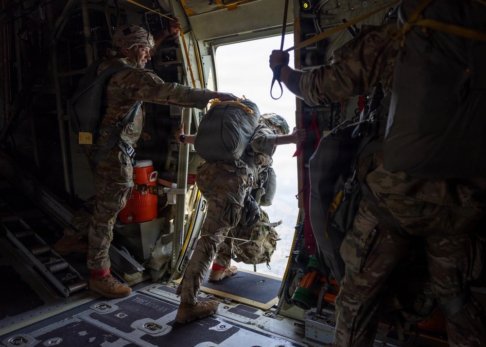 Paladin60's tweet photo. U.S. Army 1st Lt. Olivia Bryant, a plans officer assigned to 1st Battalion, 501st Parachute Infantry Regiment, 2nd Mobile Brigade Combat Team (Airborne), 11th Airborne Division, conducts actions in the door before a multinational airborne jump during Super Garuda Shield 26 in South Sumatra, Indonesia, Sept. 4, 2026. Super Garuda Shield is an annual exercise between the Indonesian National Armed Forces and U.S. military designed to strengthen bilateral interoperability, capabilities and cooperation. (U.S. Army photo by Spc. Jonathan Reyes)