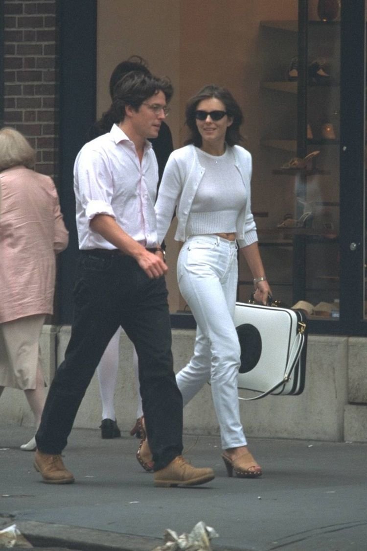 LuxoraWorld's tweet photo. Nobody did casual street style quite like Elizabeth Hurley and Hugh Grant in their prime. https://t.co/OWWTD9pFSn