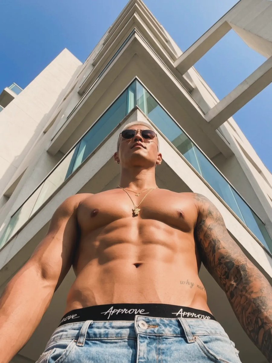 RomezzyLopez's tweet photo. Just another day pretending I’m not the hottest guy by the pool. 😏 Sun out, shades on, and zero plans to behave.

#MensFashion #TattooedMen #SummerVibes https://t.co/NFEDGsV8y8