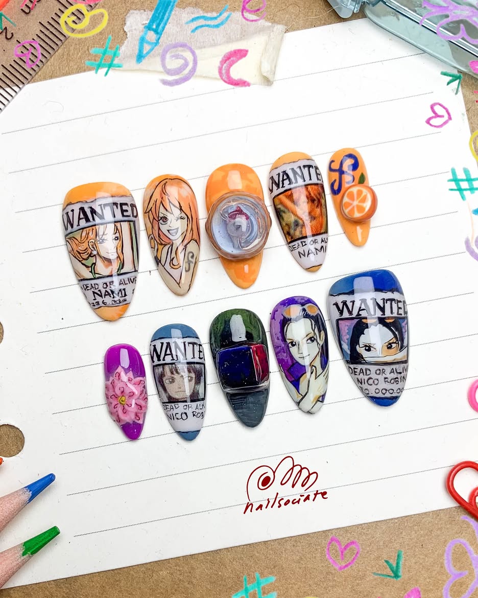 nailsociate's tweet photo. Nami &amp; Nico Robin from One Piece on nails! 🍊🌸💜 https://t.co/AWHpA2Eoc3