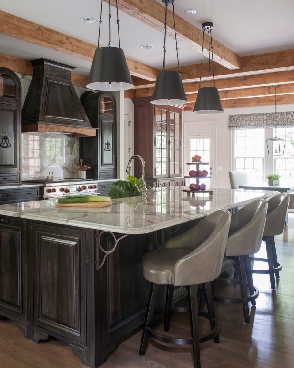 baka_programmer's tweet photo. Rustic charm meets classic craftsmanship. Warm wood beams, rich cabinetry, and timeless details create a kitchen that feels grounded, refined, and built to last. https://t.co/91sfbpdNgP
