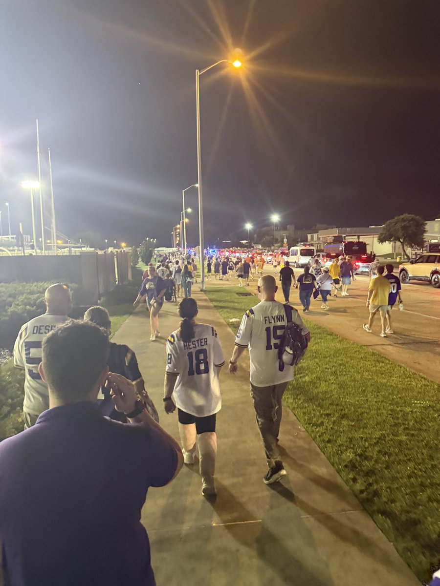 OTB_ESPN's tweet photo. Anybody know these two wearing the Flynn &amp; Hester jerseys? 🐅💜💛 https://t.co/UfMLKwLrvw