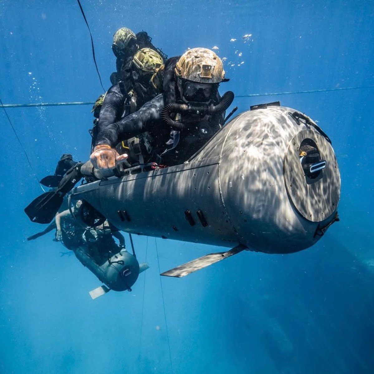 CollinRugg's tweet photo. US Navy SEAL divers spent four months clearing Iranian mines from the Strait of Hormuz, according to the Financial Times.

SEAL divers worked at night from inflatable-hulled boats with help from underwater crafts to remove the mines.

"That is usually followed up by a navy diver who’s got to get in the water and approach the mine, and then put a charge on it and destroy it," said retired US Navy captain Bill Hamblet to the outlet.

"It is an extremely time-consuming process. They are doing, essentially, active bomb detonation underwater," associate fellow at Chatham House Nitya Labh said.

Remarkable.