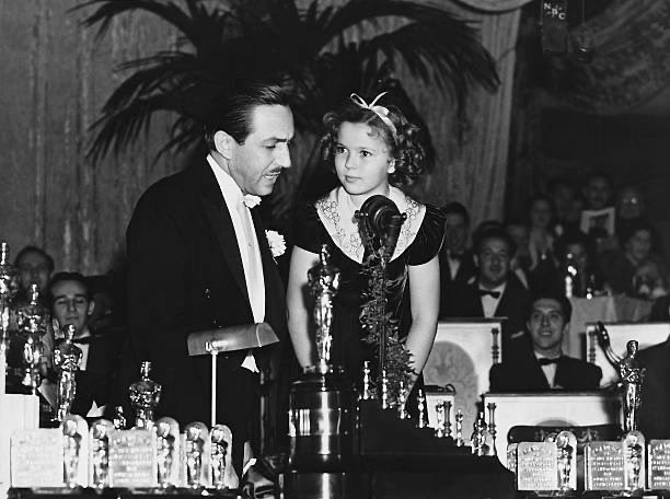 LiberianGirl779's tweet photo. "I relate to Shirley Temple. I met her in San Francisco, and I sat at her table, and I cried so bad. She said, 'What's wrong, Michael?' I said, 'I love you. I need to be around you more! She goes, 'You're one of us, aren't you?' and I said, 'Yes, I am.' Somebody else said, 'What do you mean?' and she said, 'Michael knows what I mean'” From @RuckerJael bestseller ❤️
(Pictured behind Michael is Shirley Temple)