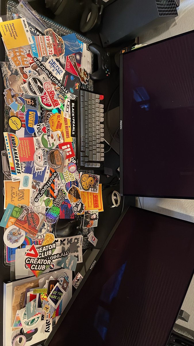 yamsdesign's tweet photo. collector of physicals. This just stash 1…i have 5 other piles of stickers, keychains, pins, patches, business cards, flyers, flatten dielines. My inspo comes these. https://t.co/wp99w1ENBu