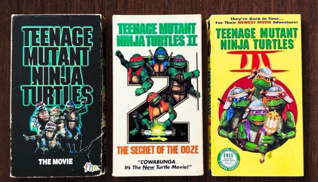 NinjaTurtleLair's tweet photo. Who still has all 3 of these sealed and put up? I started my VHS collection not too long ago. I found it harder to find a brand new VCR than these films. 😅 https://t.co/cvyZGwAPk7