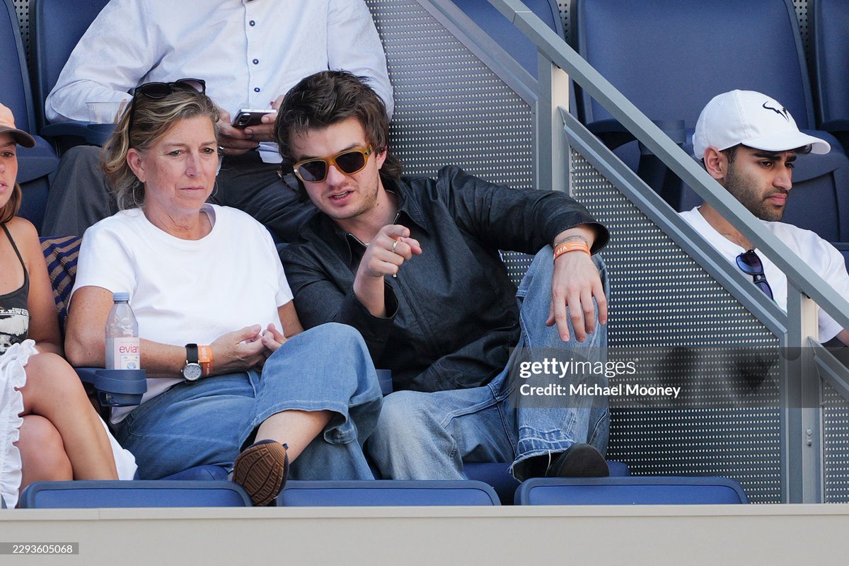 updating_keery's tweet photo. New photos of Joe Keery with his mom at the U.S. Open today! https://t.co/zwVltfw2l3