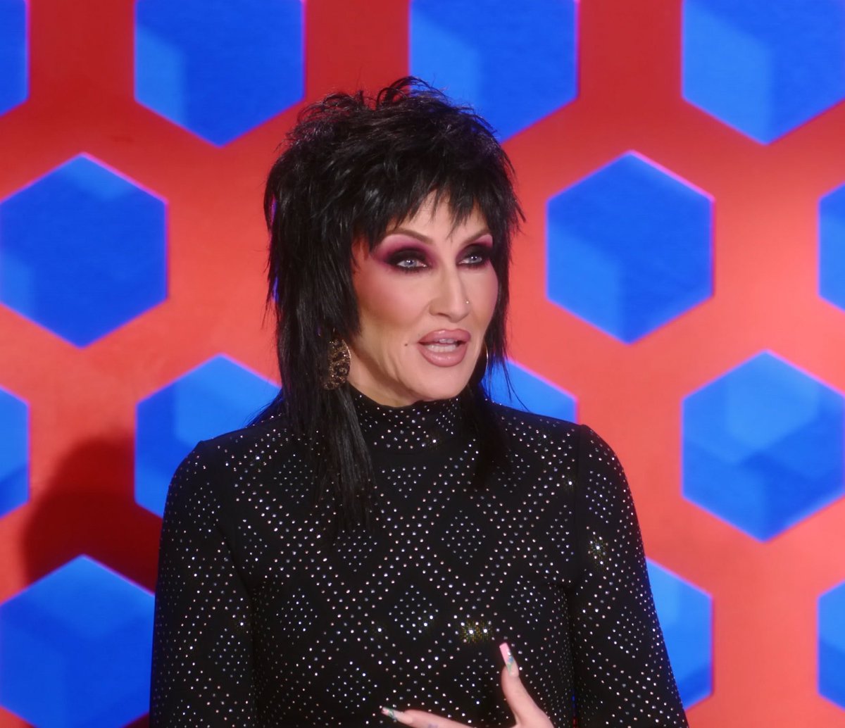 chrisisdada's tweet photo. i love michelle visages fashion journey from stereotypical jersey mom to nonbinary joan jett impersonator https://t.co/PbUvJtftlm