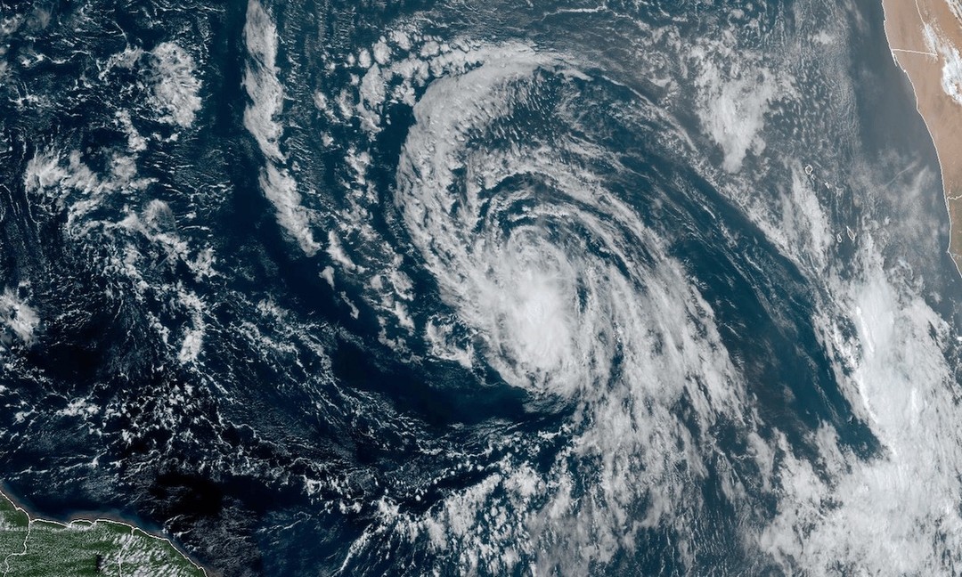 eflayae's tweet photo. The world mourned music legend Dolly Parton’s passing days before Tropical Storm Dolly formed in the Atlantic—a coincidence. Despite her global impact, the storm is expected to remain weak and pose little threat. https://t.co/L7xIIsuw3r