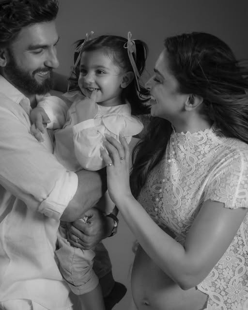 TimesNow's tweet photo. Deepika Padukone flaunts her baby bump in a stunning maternity shoot with Ranveer Singh, while daughter Dua steals the spotlight with her adorable presence. https://t.co/EwUdbTG28S